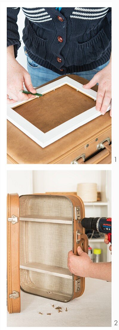 A bathroom cabinet being made from an old suitcase