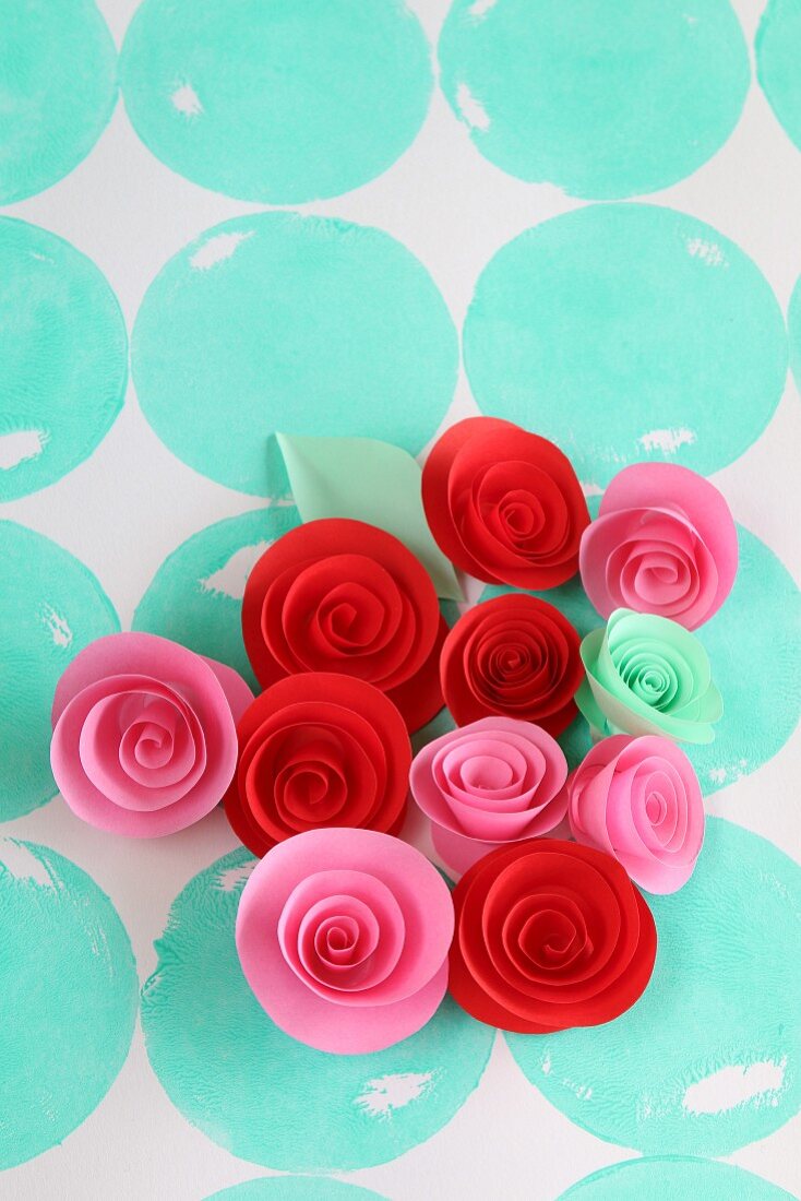 Paper flowers on polka-dot surface
