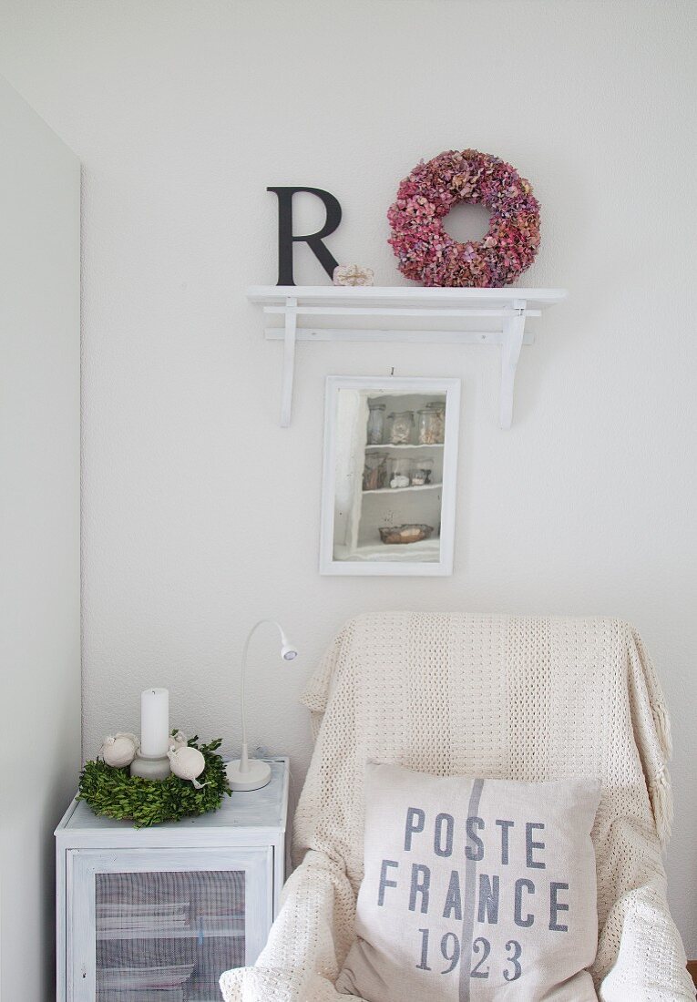 Vintage-style seating corner with vintage printed scatter cushion