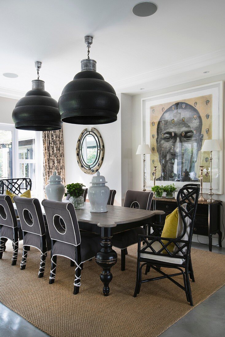 Black furniture in modern, Colonial-style dining room
