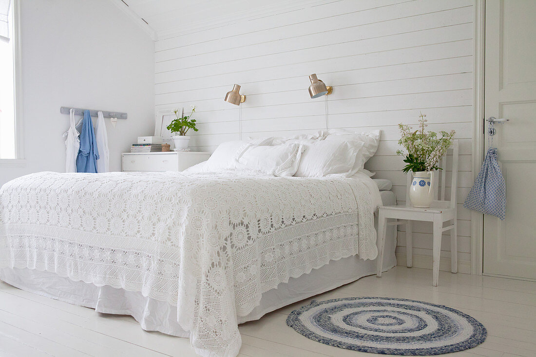 Rustic bedroom in decorated white and blue