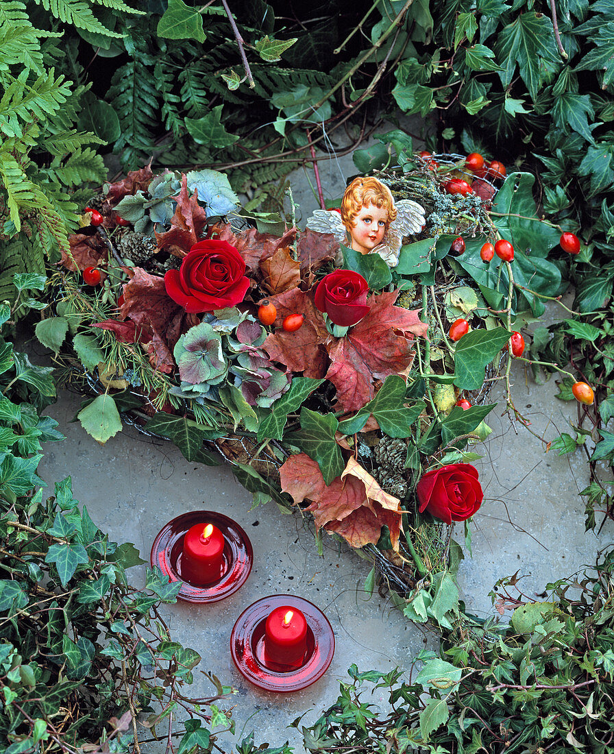 Grave decorations, heart on wire mesh heart filled with leaves