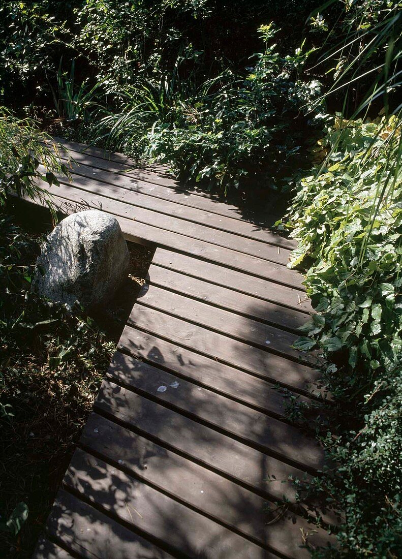 Wooden walkway as a garden path