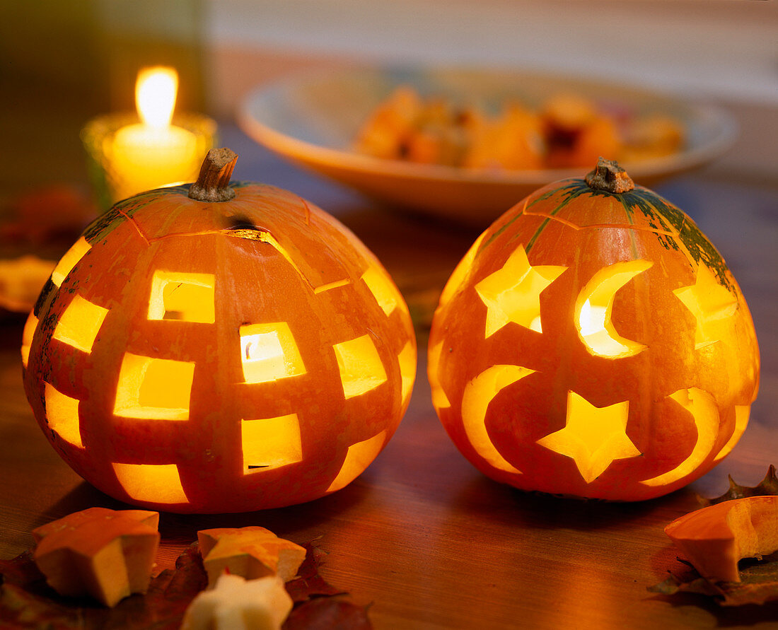 Halloween, pumpkins with squares, stars and moons