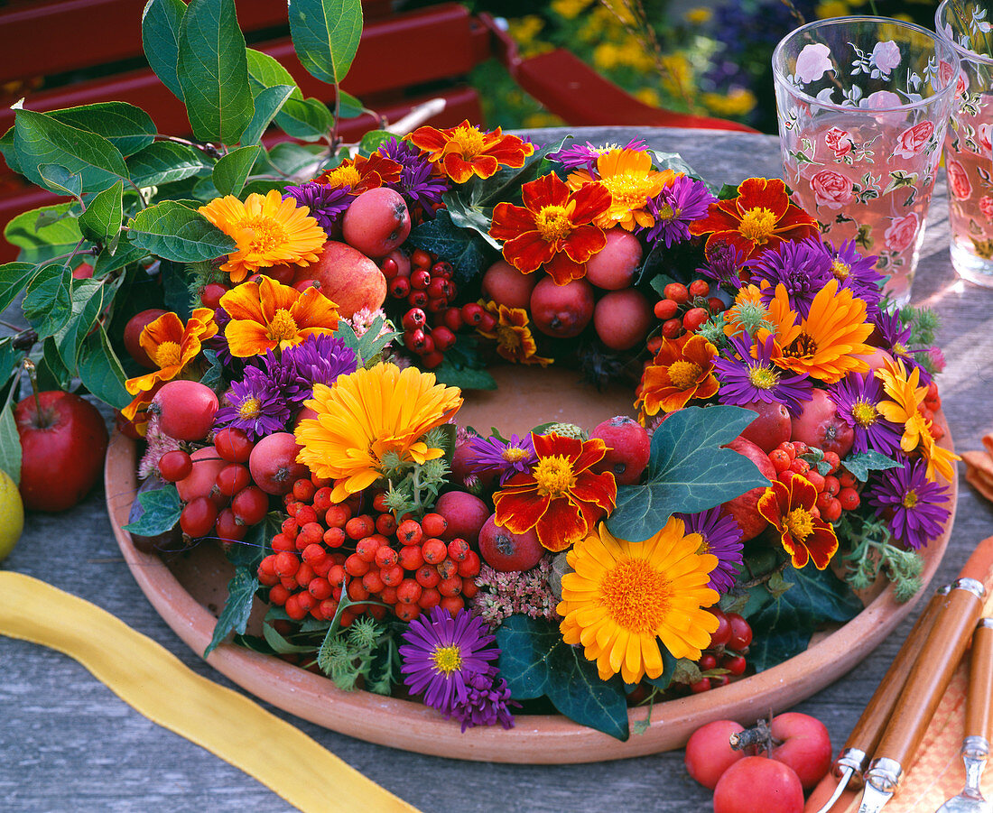 Table wreath of marigolds (calendula), berry jewelery