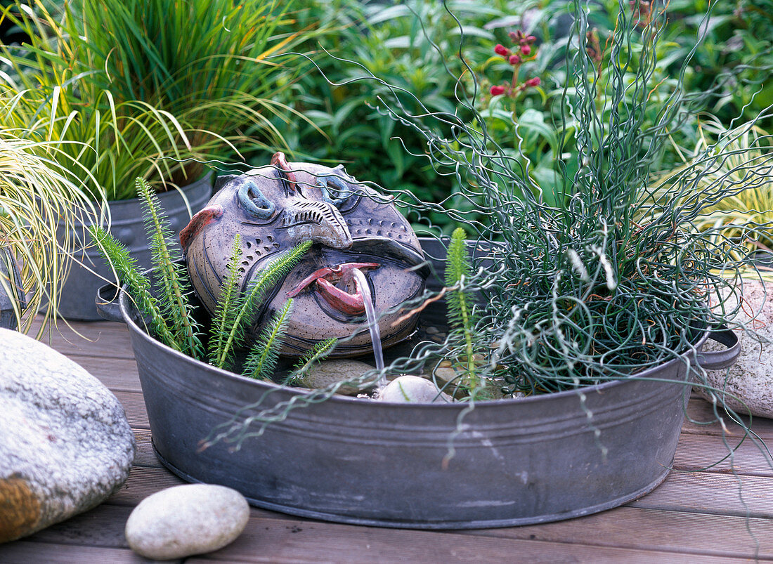 Zinc bowl with hand-made water feature
