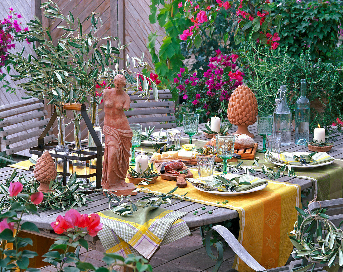 Table decoration with Olea (Olive), Rosmarinus (rosemary),