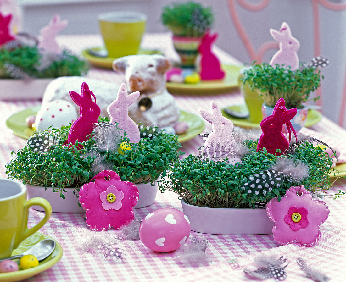 Easter table decoration with Lepidium in flat white cups