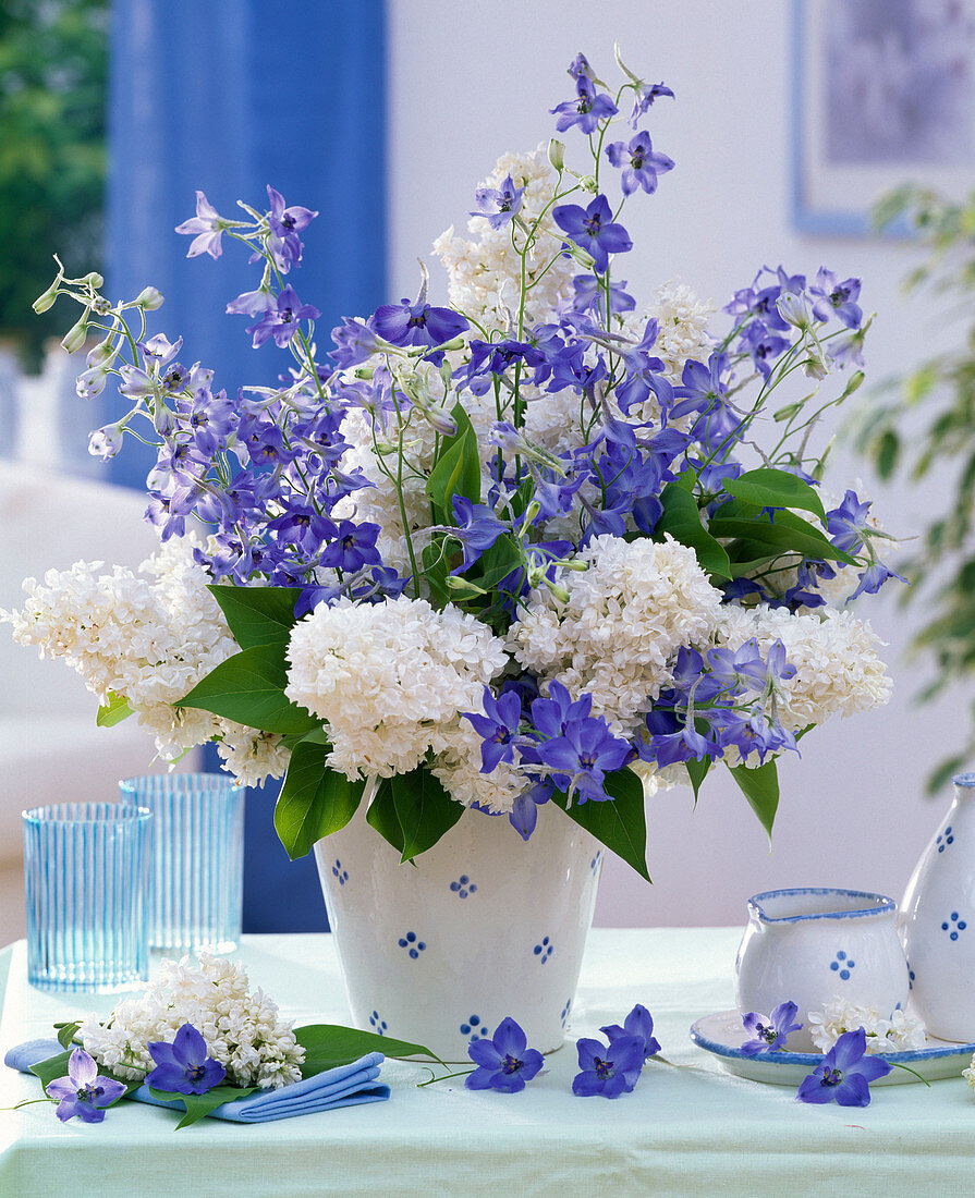 Syringa (lilac), white and Consolida bouquet