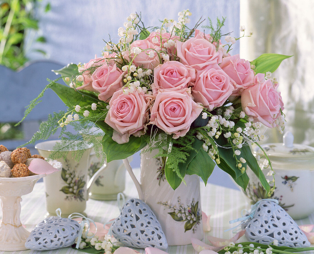 Bouquet with pink (rose), Convallaria (lily of the valley), asparagus
