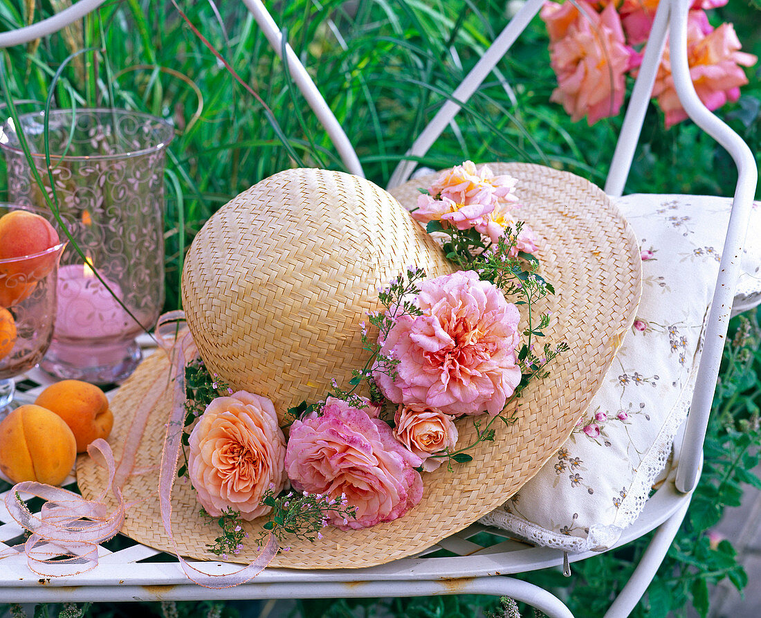 Hat decorated with flowers of pink (rose)