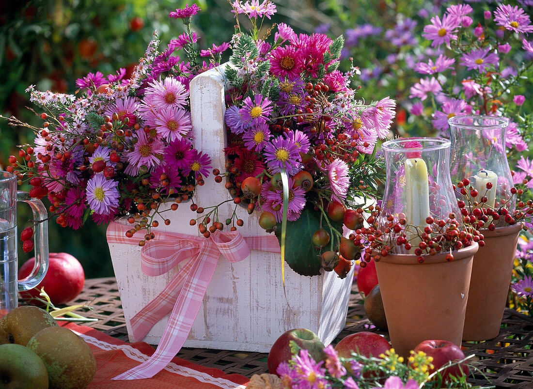 Asters bouquet in the wooden basket