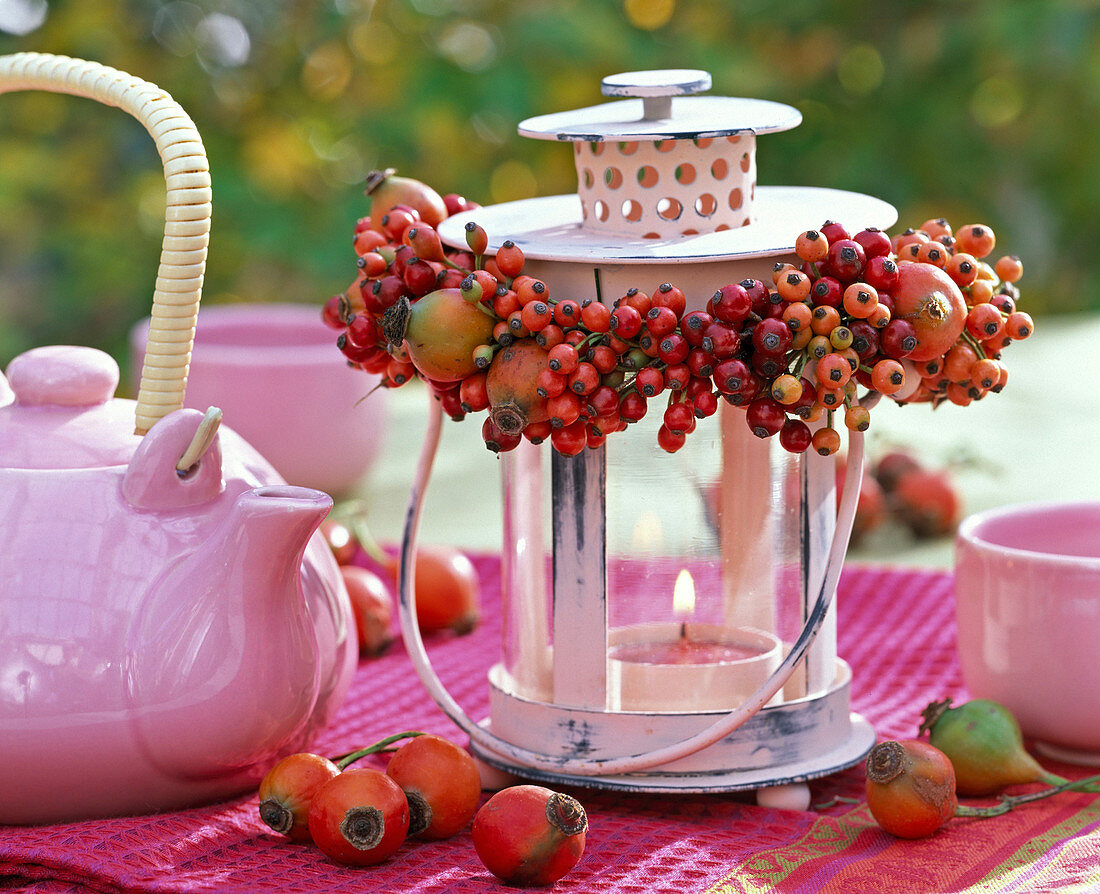 Lantern with wreath of berries and fruits