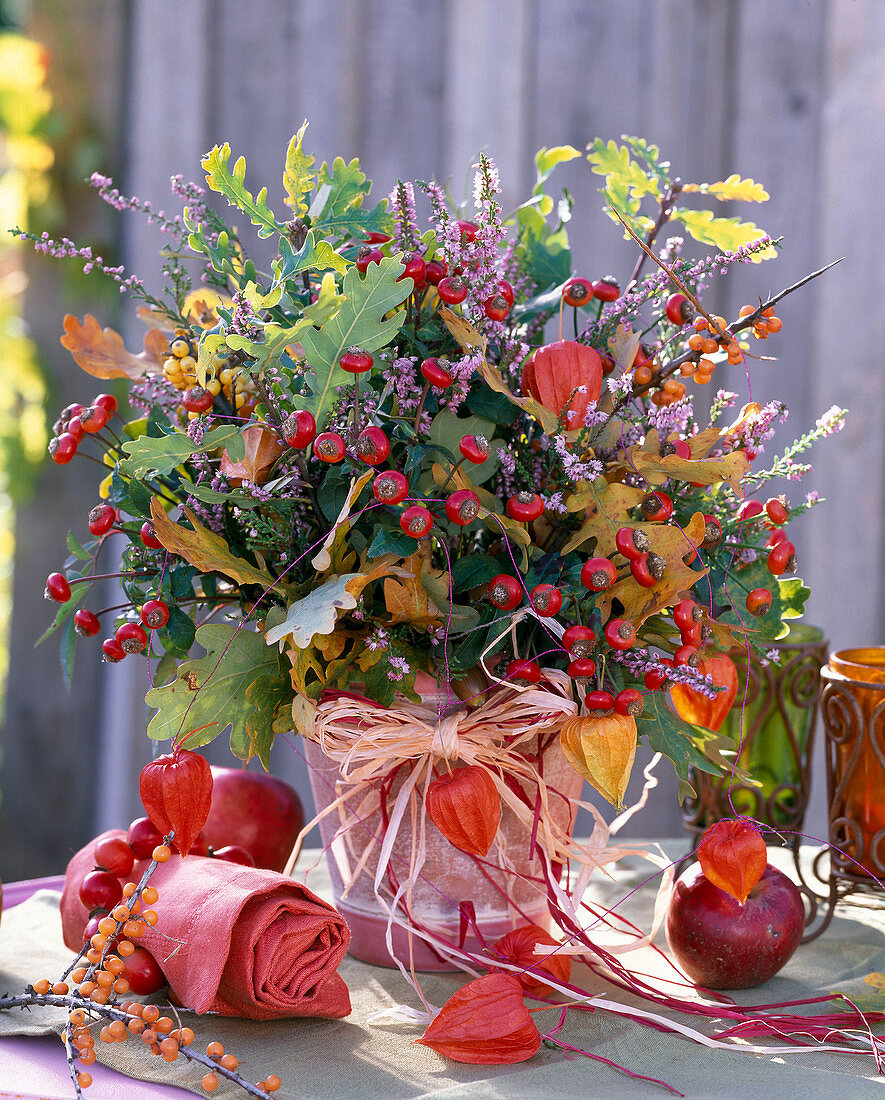 Berries, fruits and autumn leaves bouquet