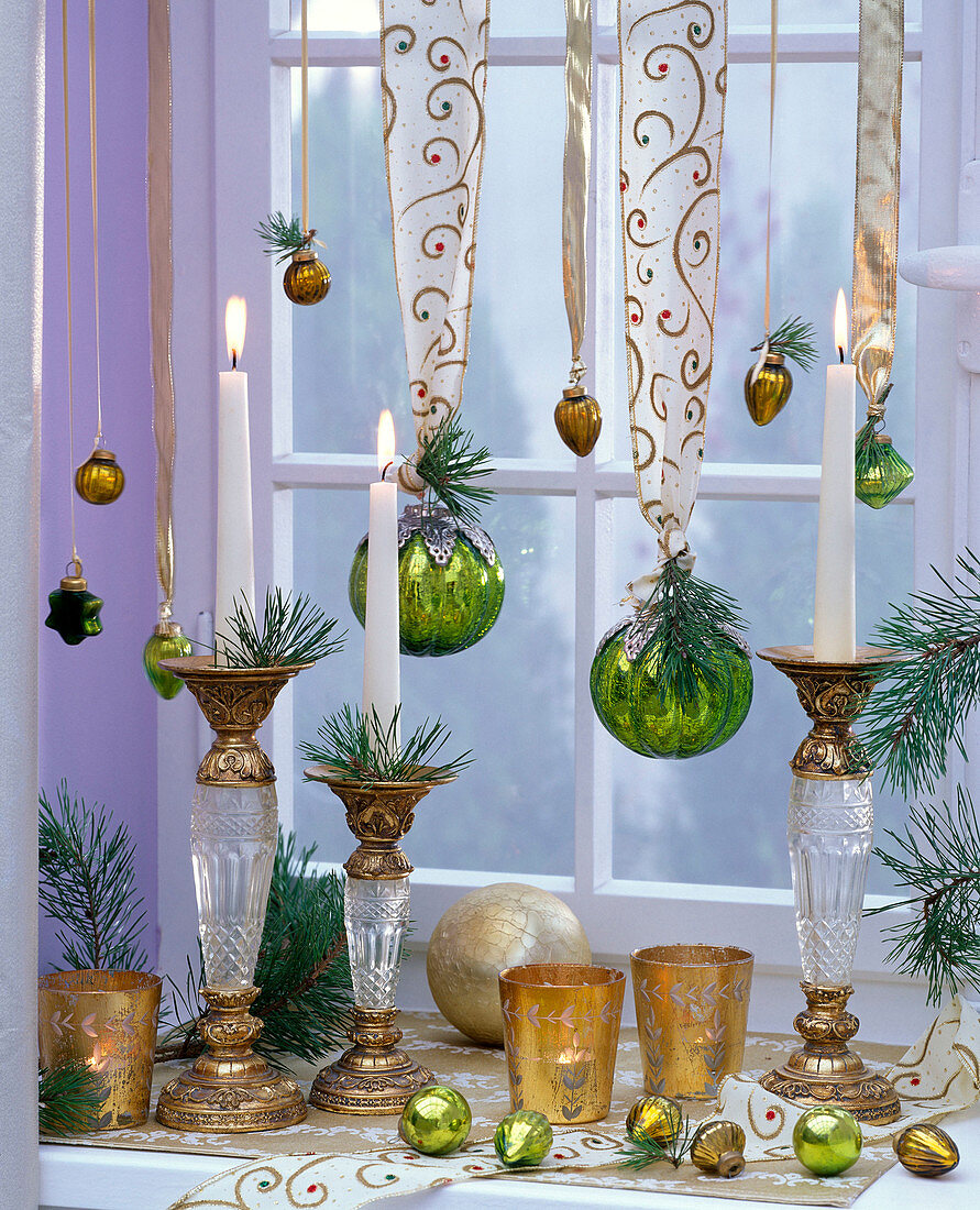 Pseudotsuga, green and golden Christmas tree balls on velvet ribbons