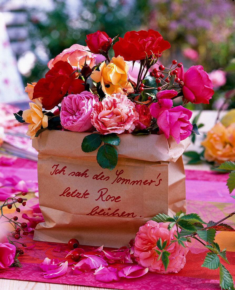 Bunch of roses in paper bag