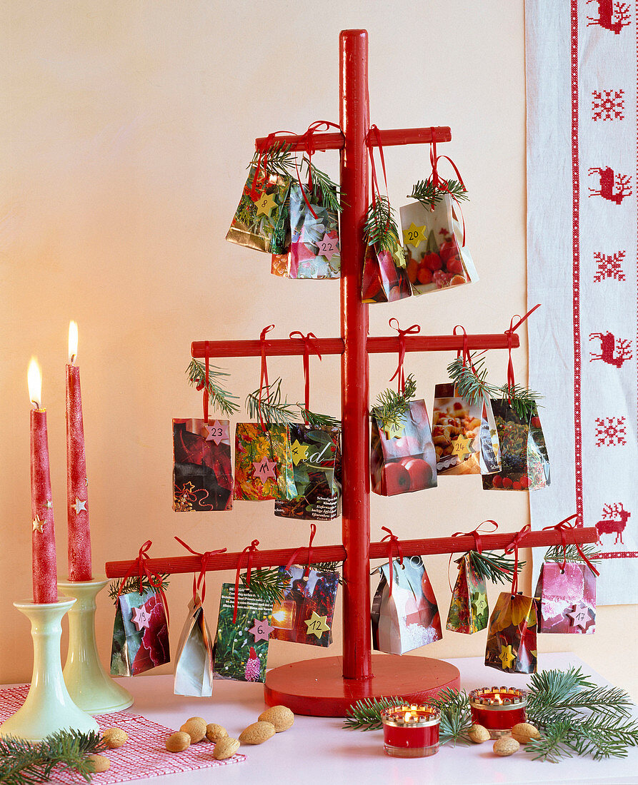 Advent calendar with little bags with branches of Pseudotsuga
