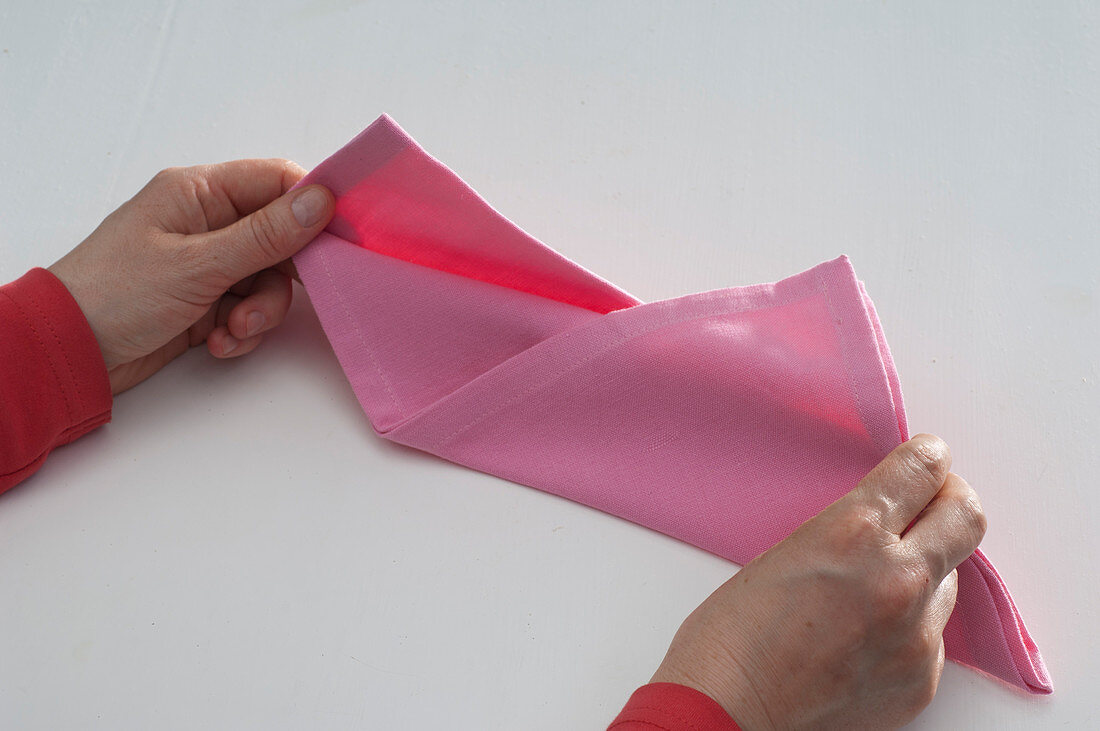 Folding napkins