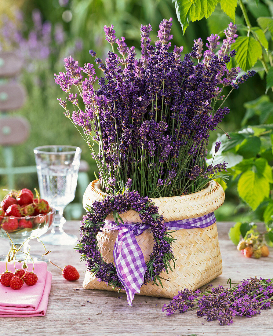 Lavandula bouquet in basket, decorated with lavender wreath