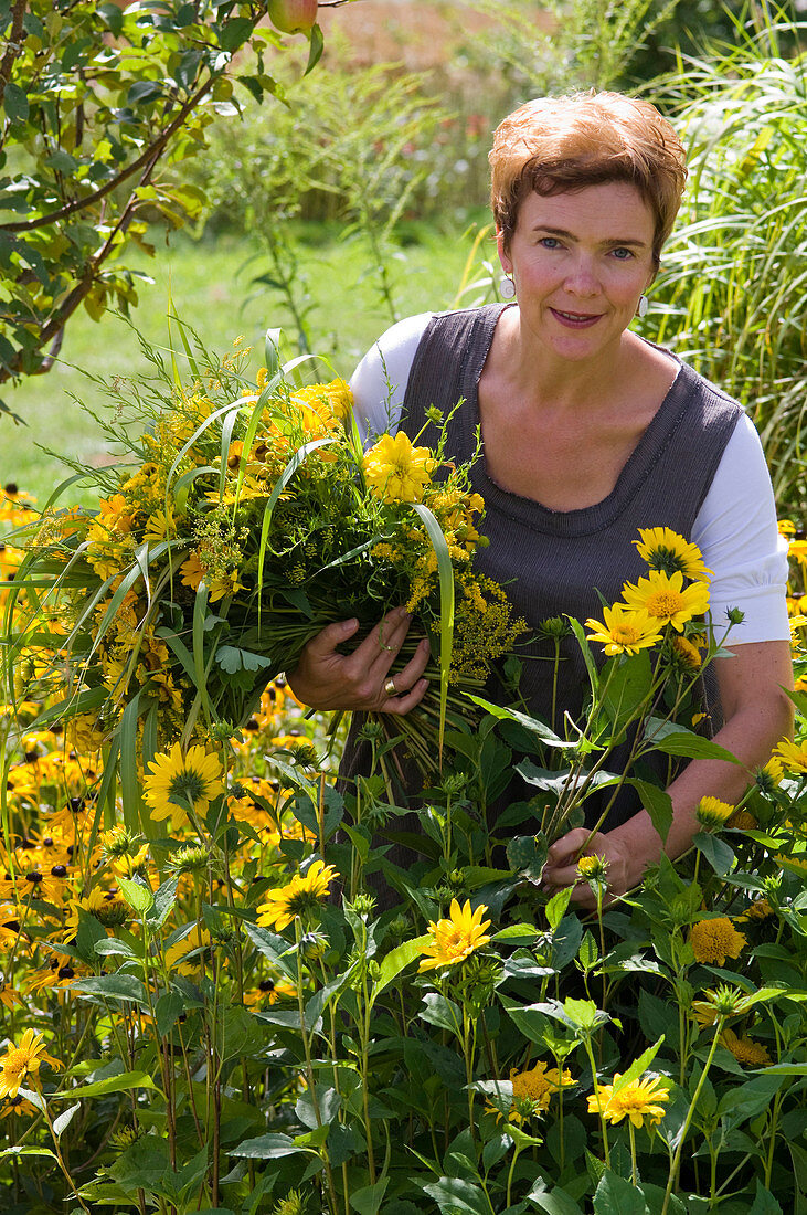 Woman cuts bouquets