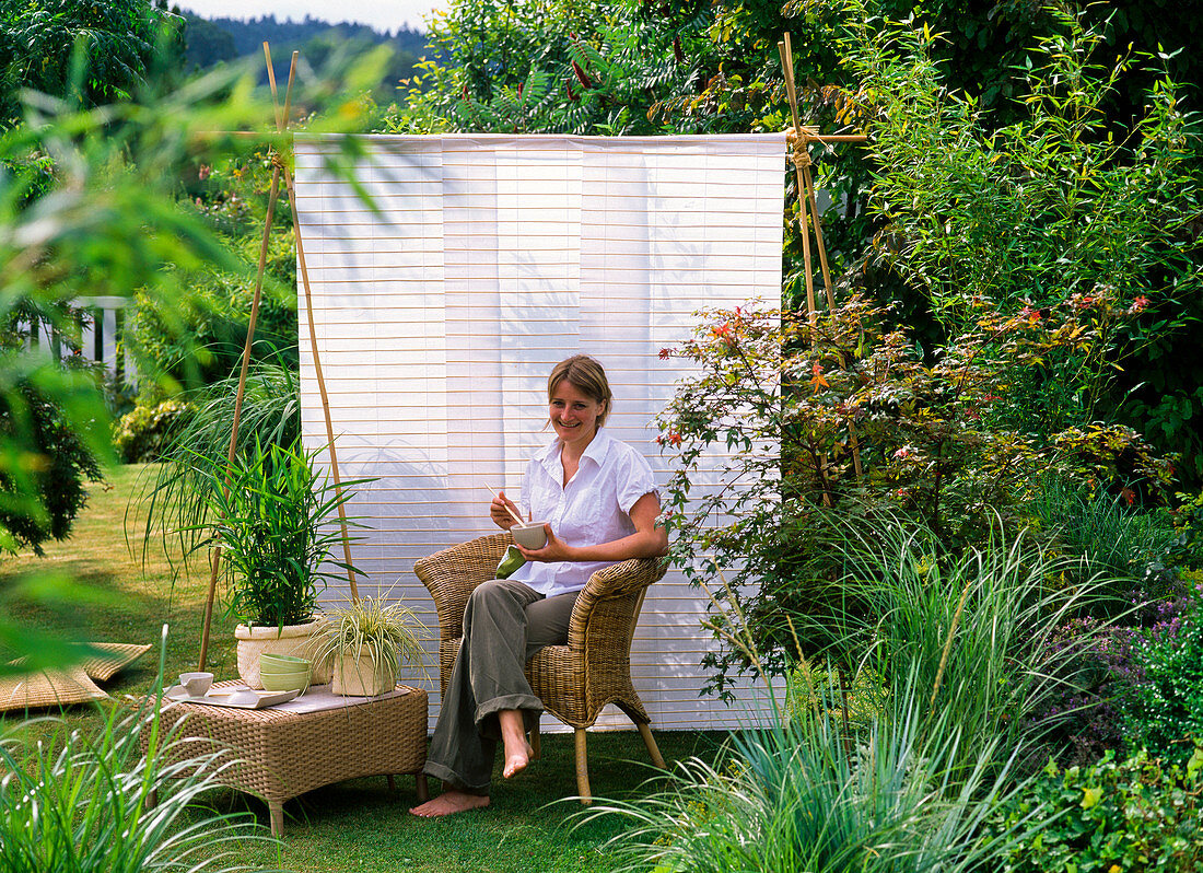 Asian seat in the garden with sunshades