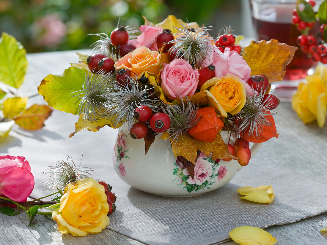 Small autumn arrangement in big cup