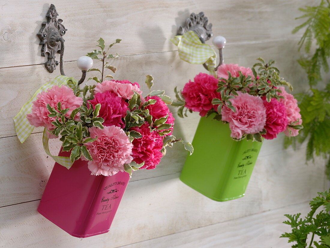 Small bouquets made of dianthus (carnation) and pittosporum