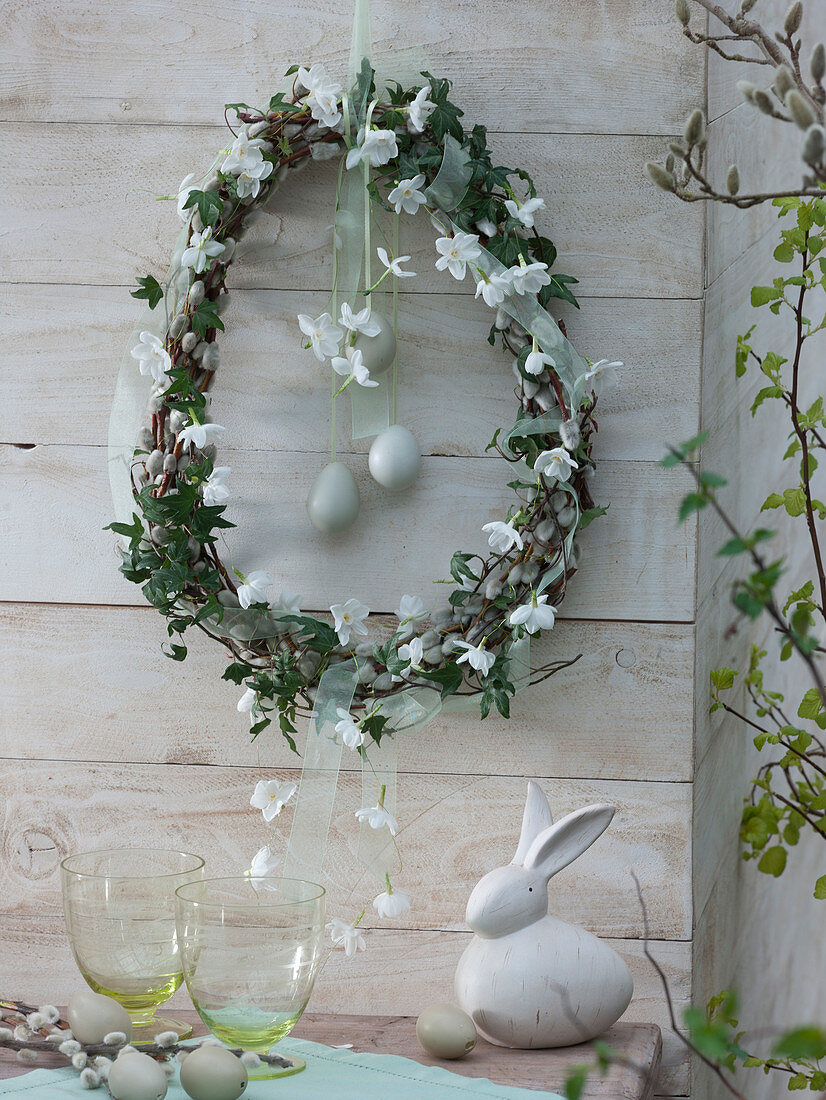 White Easter wreath in egg shape