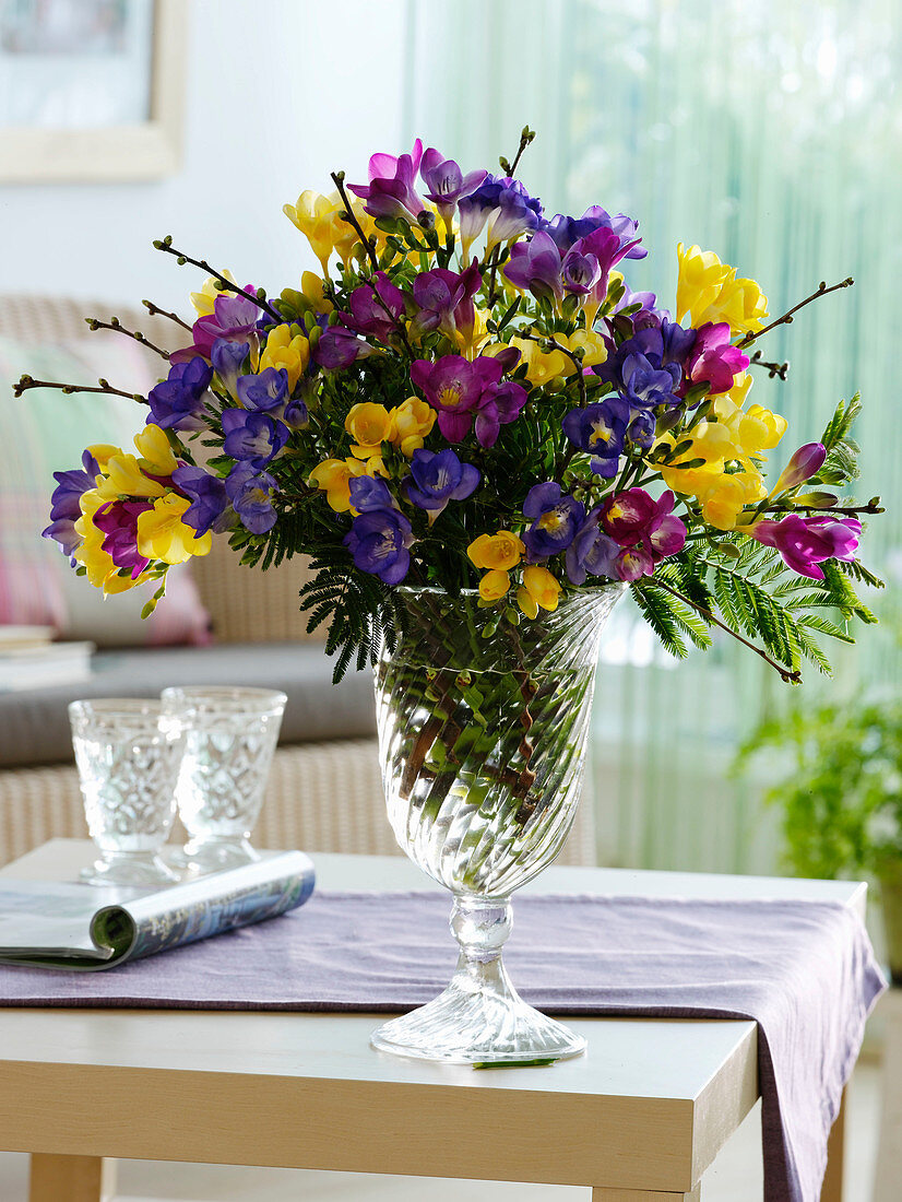 Fragrance bouquet of Freesia (Freesia) in yellow, blue and purple