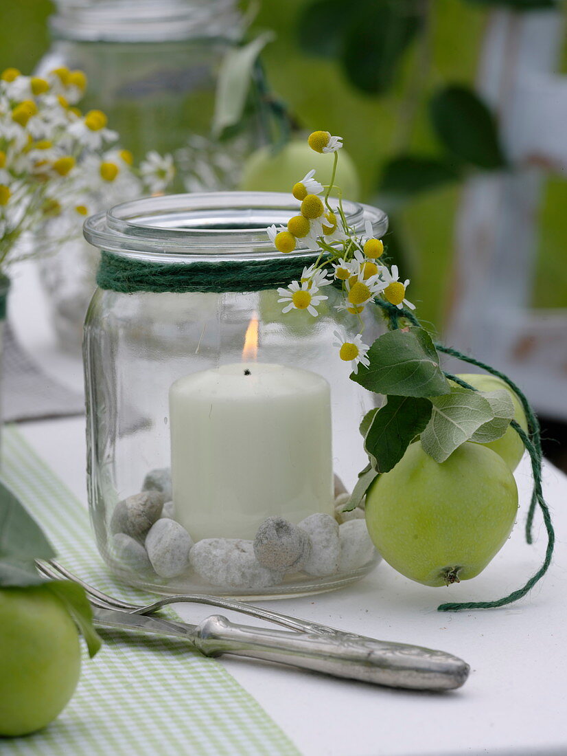 Apple table decoration in the summery meadow