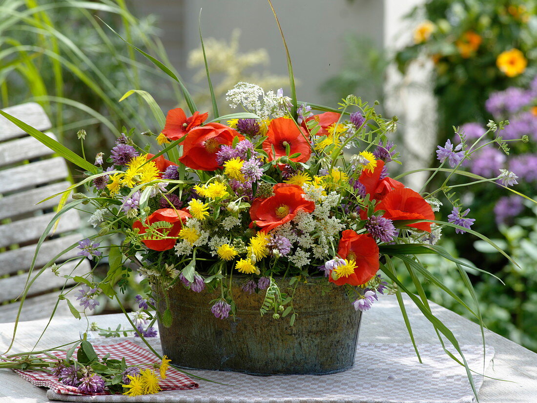 Jardiniere with meadow flowers