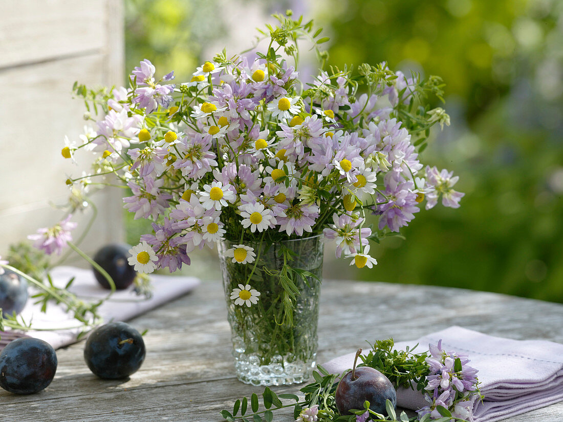 Meadow bouquet of chamomile and reverdin's blue
