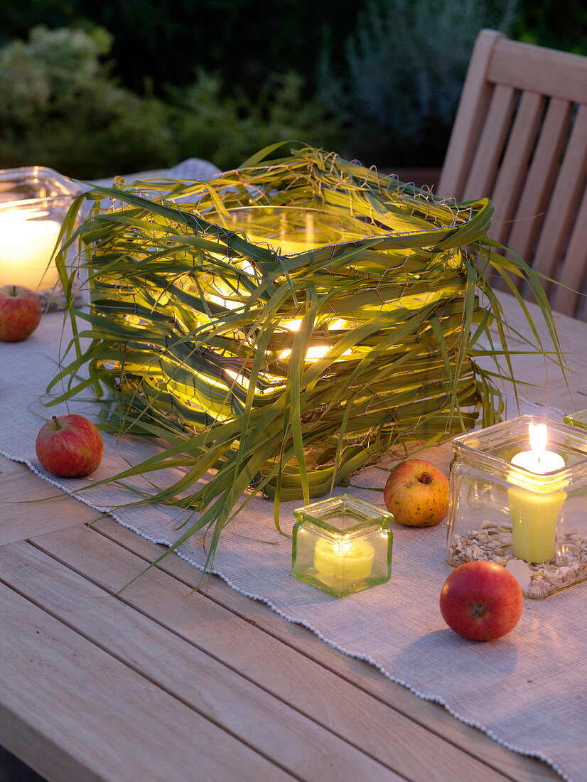 Lantern with miscanthus braided in square hare wire