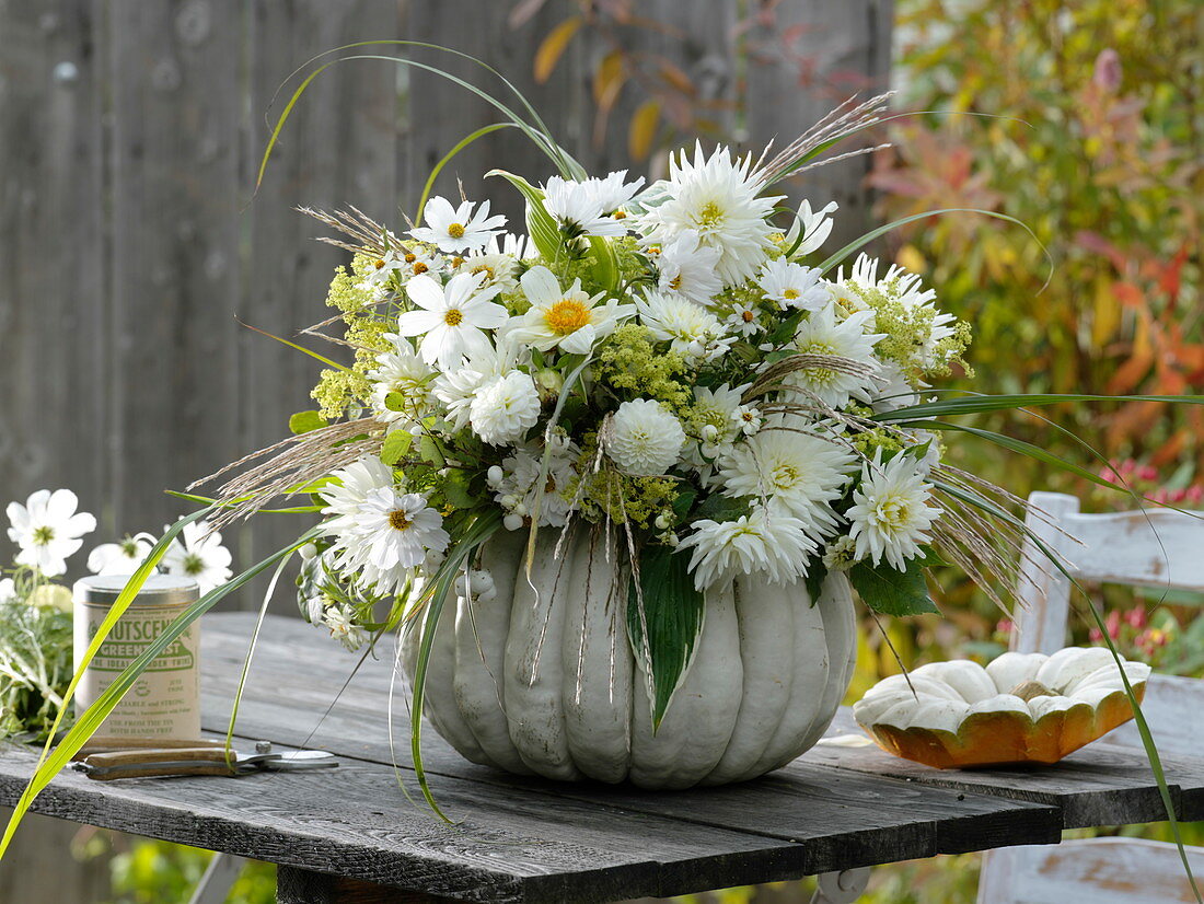 Hollowed pumpkin with white bouquet