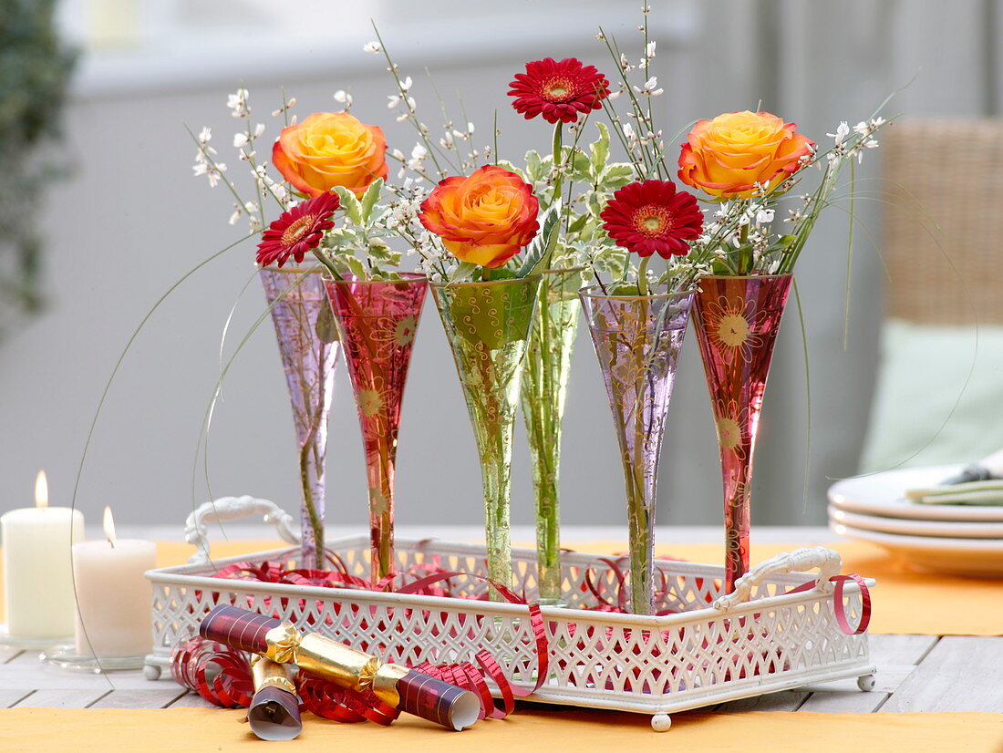New Year's table decoration with roses and gerberas