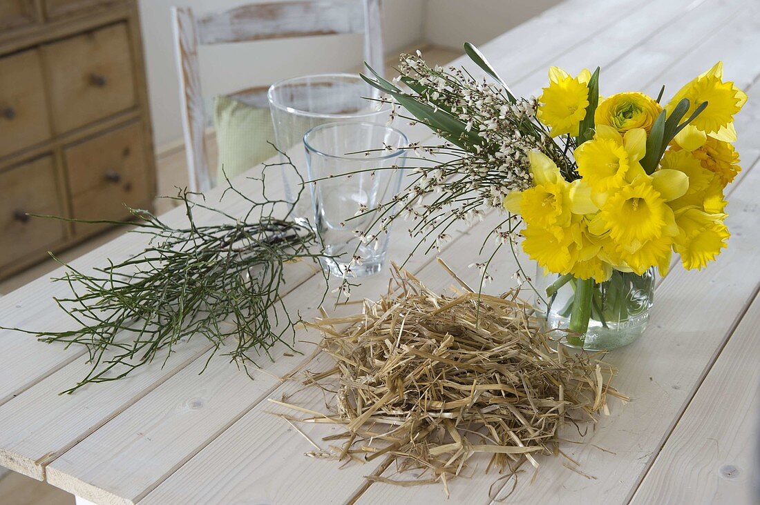 Yellow spring bouquet in straw vase