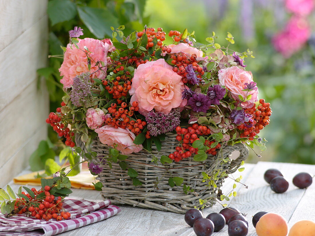 Late summer arrangement of rowan berries, Rose