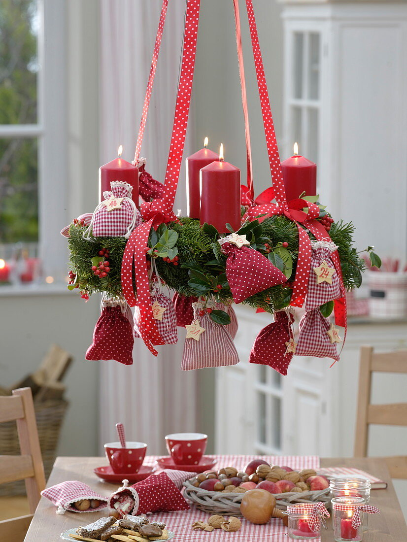 Advent wreath as hanging advent calendar