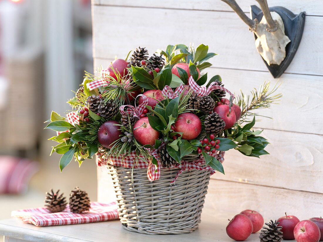 Christmas apple bouquet in the basket