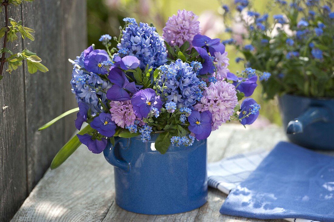 Blue-pink bouquet in blue pitcher