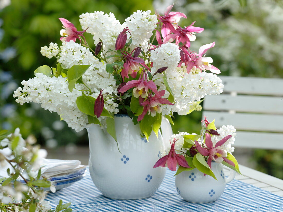 Fragrant spring bouquet with syringa (lilac) and aquilegia
