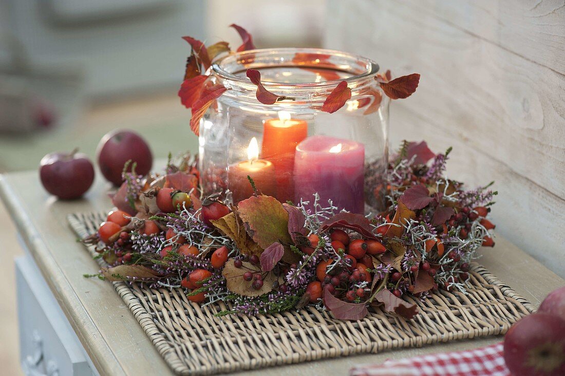 Autumn wreath with candle-glass in the middle