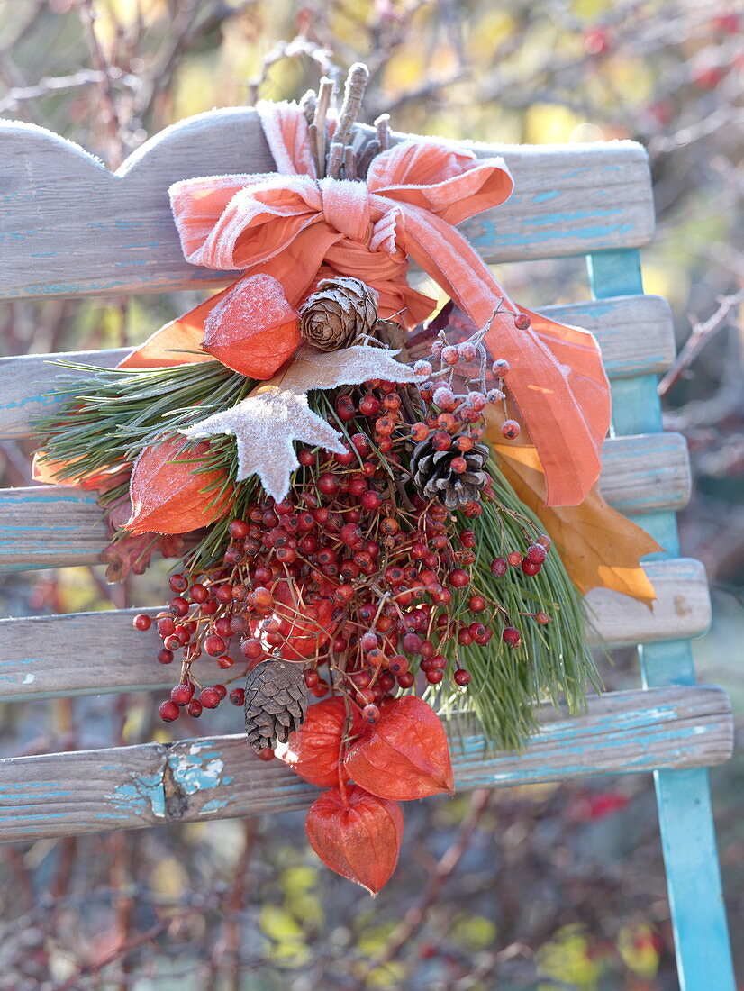 Small frozen autumn bouquet on chair back