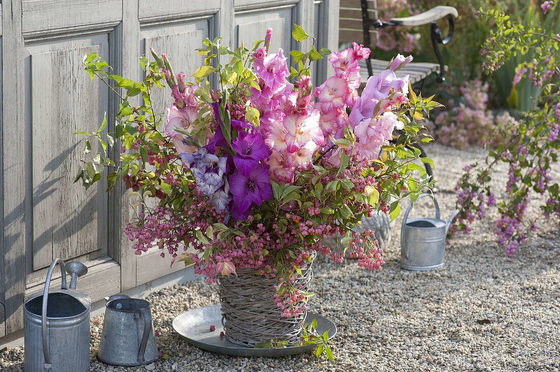 Bouquet with gladiolus and Euonymus eropaeus