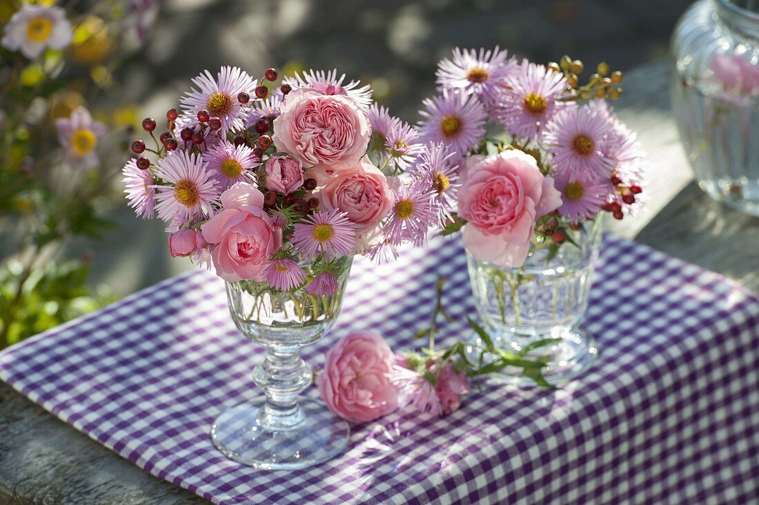 Small bouquets with aster, rosehip and Rose