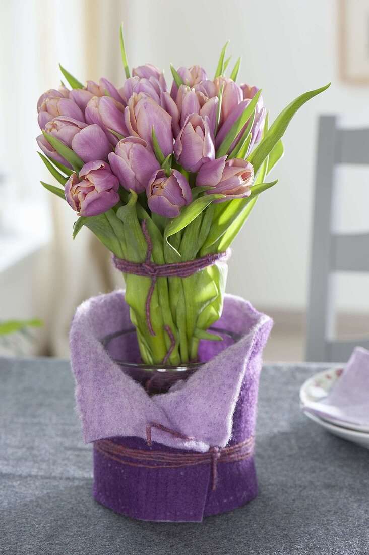 Standing bouquet with tulipa (tulip) in vase with felt cover