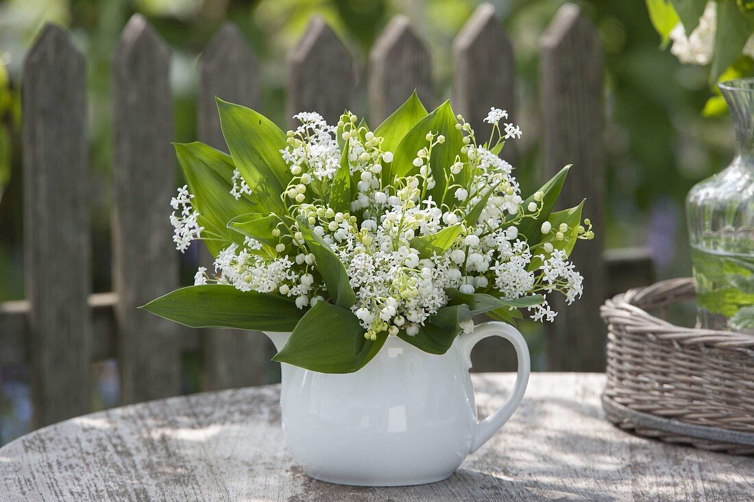 White bouquet of Convallaria (Lily of the Valley) and woodruff