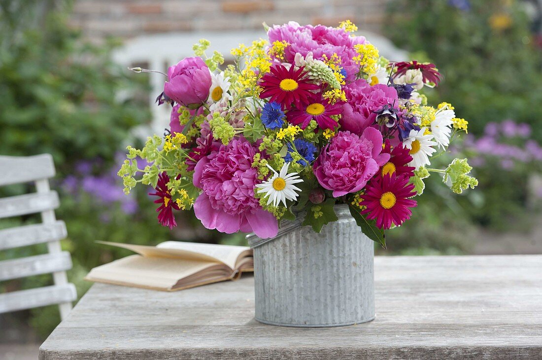 Colourful garden bouquet with peonies