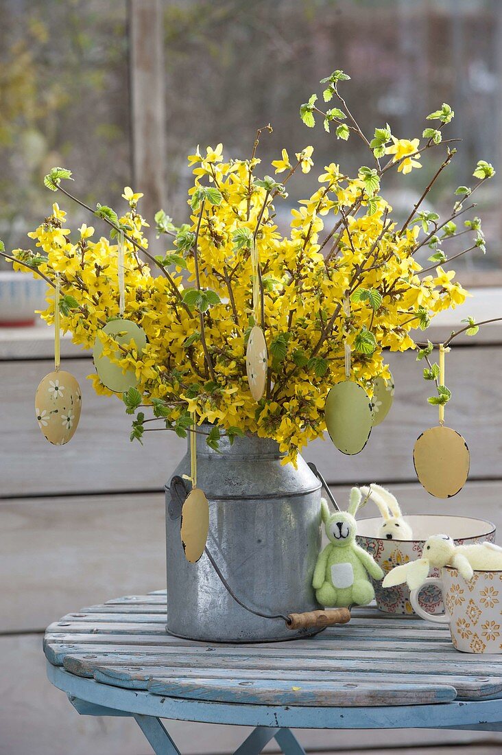 Easter bouquet with branches of Forsythia and Corylus