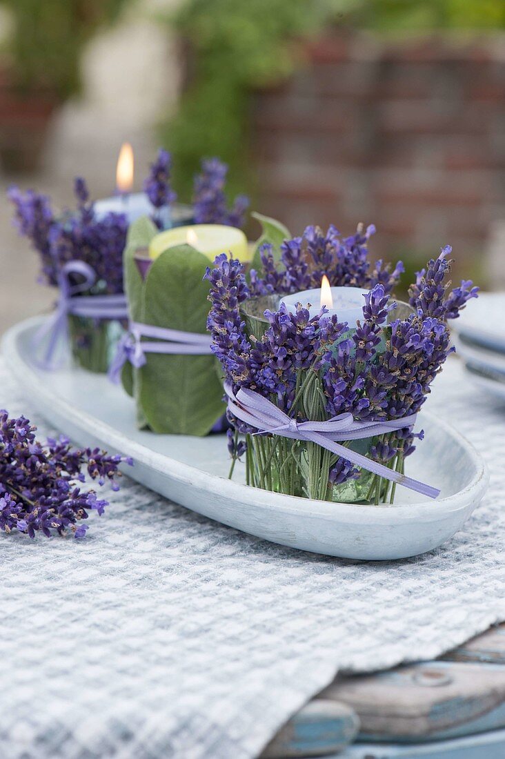 Lanterns in herb dress as a table decoration